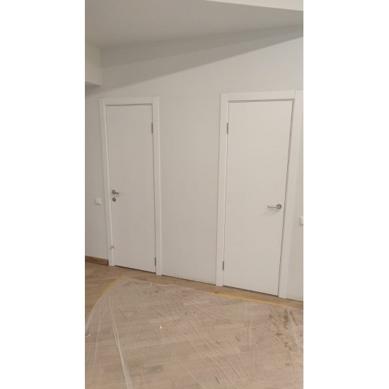 Крашенные белые гладкие двери PROF MODERN RAL 9003